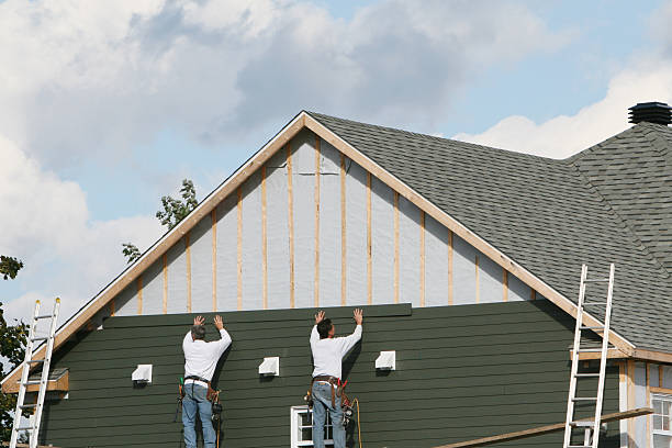 Professional Emergency Siding Repair technician working in Thomaston, NY